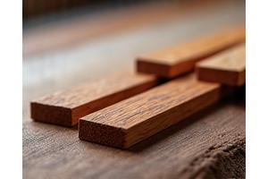 Close-up view of beautifully grained, hand-selected hardwoods, possibly cedar or mahogany.
