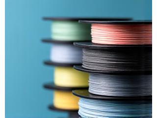 Various spools of fishing line, including monofilament, fluorocarbon, and braided lines.